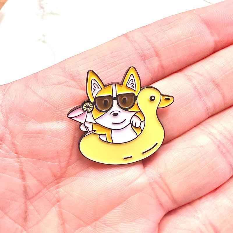 Corgi Floaty Enamel Pin featuring a relaxed corgi in a colorful summer float.