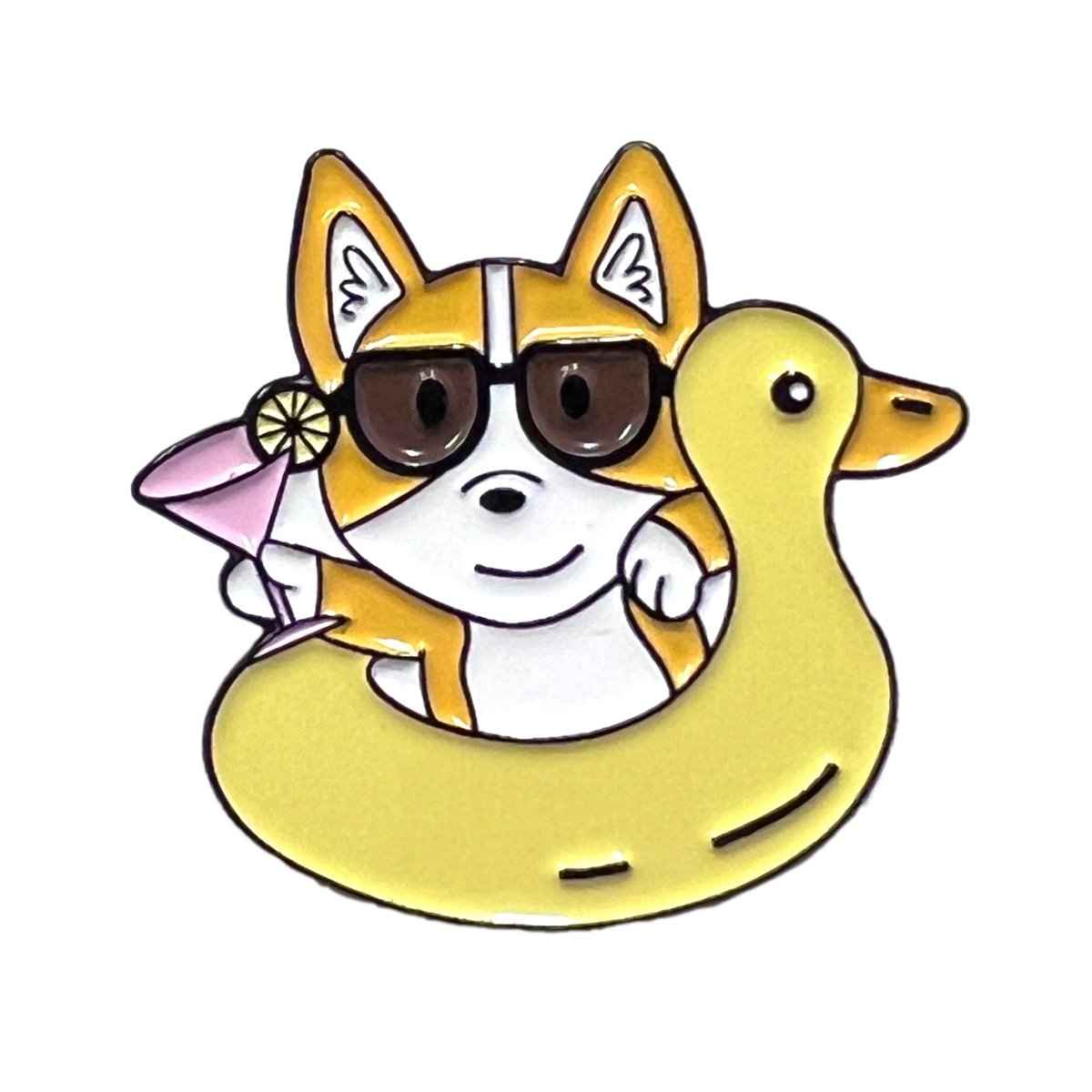 Corgi Floaty Enamel Pin featuring a cute corgi enjoying a summer poolside vacation